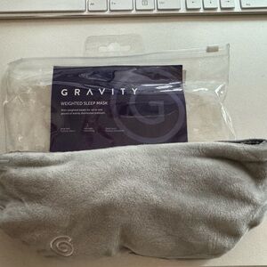Gravity weighted sleep mask